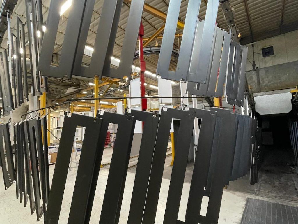 Coating metal in a warehouse